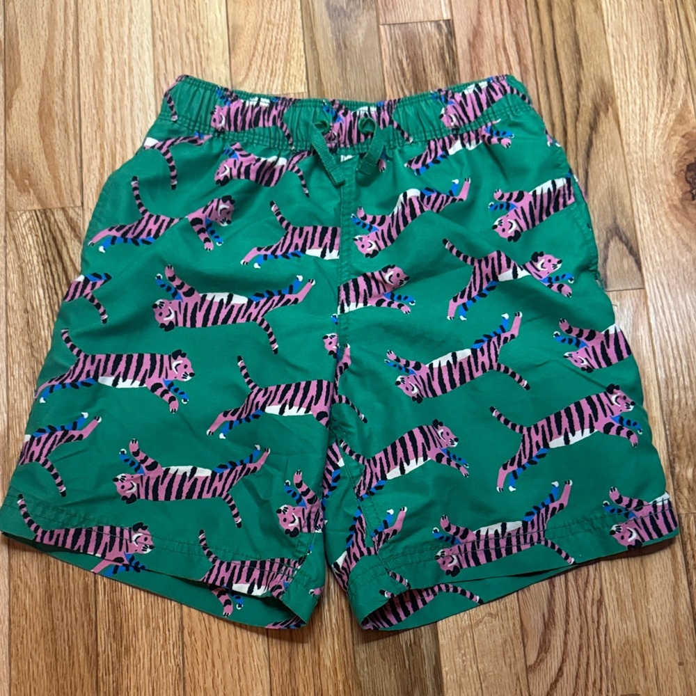 Hanna Andersson Green Swim Trunks with Pink Tiger Print